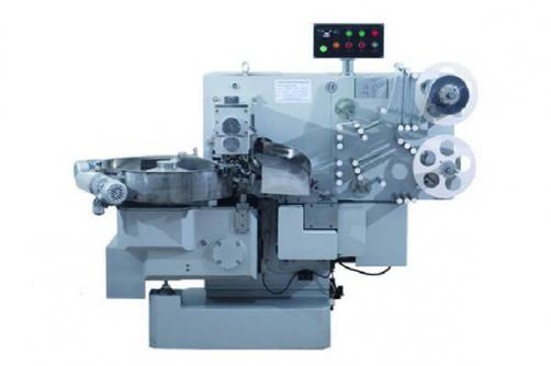 Double twist packing machine Featured Image